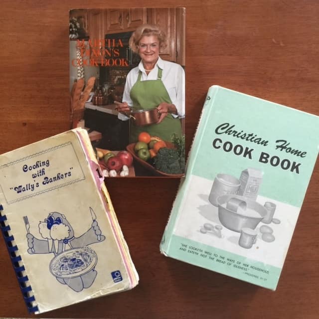 Three well-used cookbooks from my kitchen. One from the bank my Aunt Patty worked at when I got engaged. The top one my mom gave me when I got married {it is the same one she's had since 1960} and the third I found at a yard sale when I first had kids.